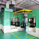 Conveyorised paint booth